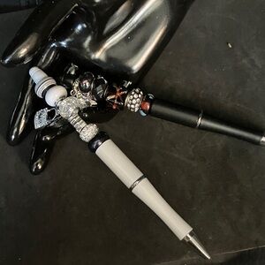 Black and White Ballpoint Pens with Silver Accents